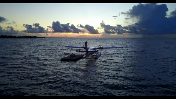Aerial top view seascape of beautiful island beach voyage by blue ocean and white sand background of alt