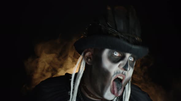 Frightening Man in Skeleton Halloween Makeup Making Angry Faces, Shaking Head, Showing Tongue alt