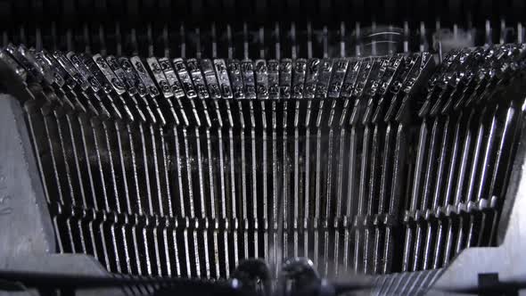 Keys Hitting in a Typewriter alt