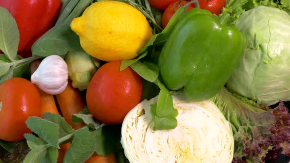 Vegetables on a Tray Close-up. Vegetables on the Kitchen Counter. Tomato Cucumber Zucchini Onion