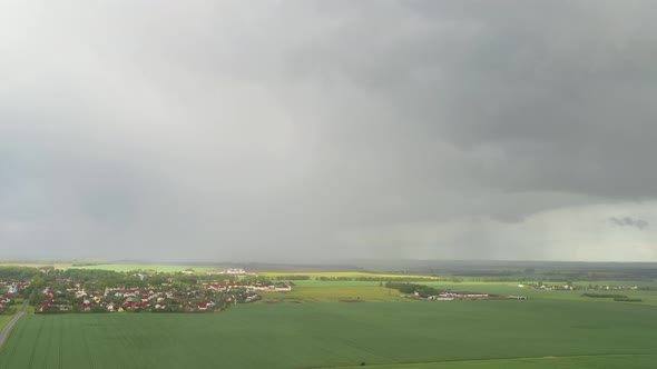 Top View of a Sown Field After Rain with a Rainbow in Belarus