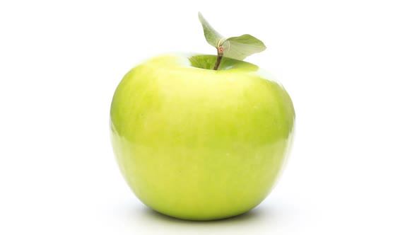 Rotating Green Apple Isolated on White Loop