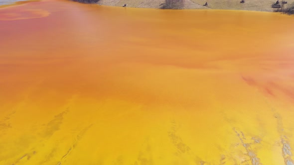 Orange Toxic Waste Water From a Copper Mine alt
