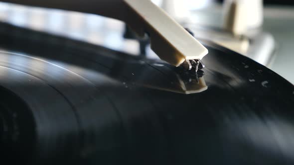 Close Up of Needle Over the Spinning Vintage Vinyl Record Player, Nostalgia alt