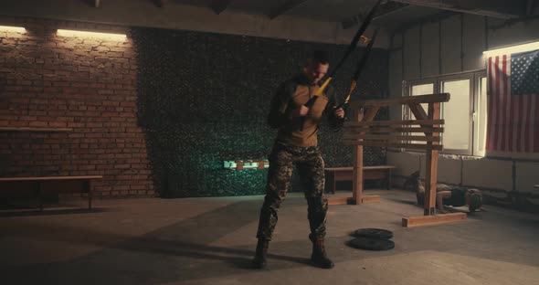 Male Soldier Doing TRX Exercise in Gym alt