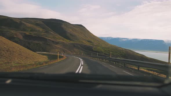 Drivers Perspective of Mountain Road in Iceland POV View From Car Window alt
