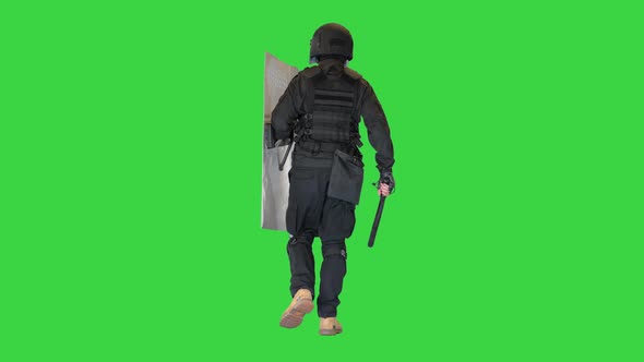 Riot Police Unit Walking with a Shield and Baton on a Green Screen Chroma Key alt