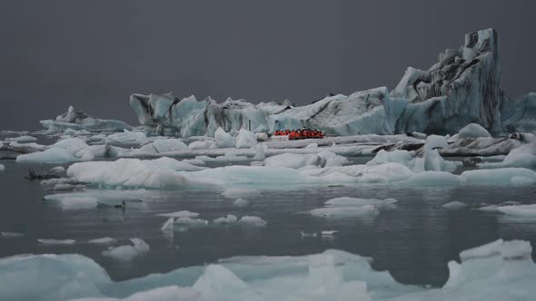 Tourist Boat Profile Sailing Near Huge Glacier in Jokulsarlon
