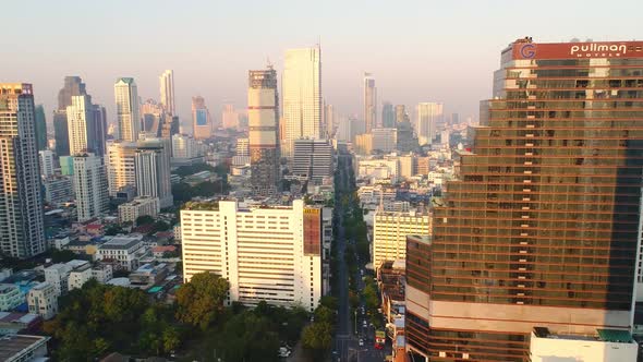 4k Aerial city view of Bangkok dowtnown, Flying over Bangkok, Thailand. alt