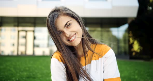 Portrait of Smiling Woman Outdoors