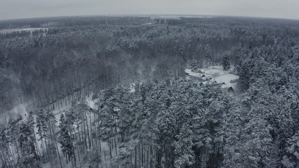 Winter Landscape of a Russian Village in the Forest