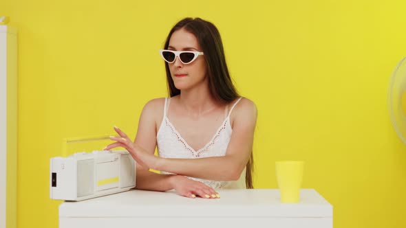 Woman In Cat Eye Sunglasses Has Fun alt