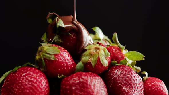 Strawberry in Melted Chocolate Closeup Melting Chocolate Bar for Fondue alt