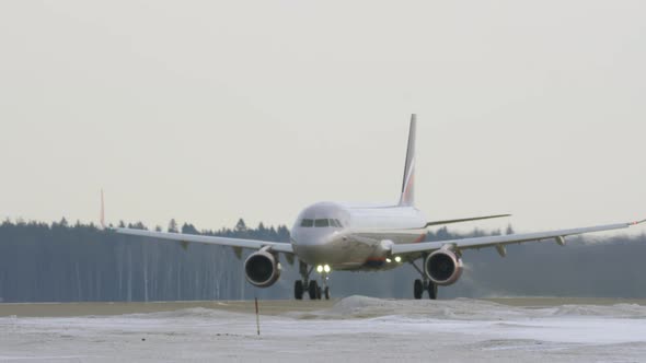 Airbus A320 of Aeroflot taking off, winter shot Moscow alt