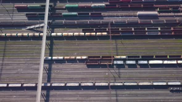 Aerial View of Railway Sorting Station and A Lot of Wagons at a Railway alt