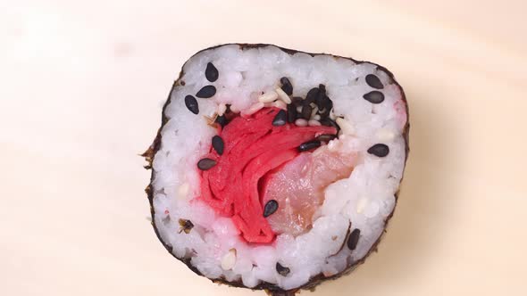 sushi rolls dyeing close-up slow mo