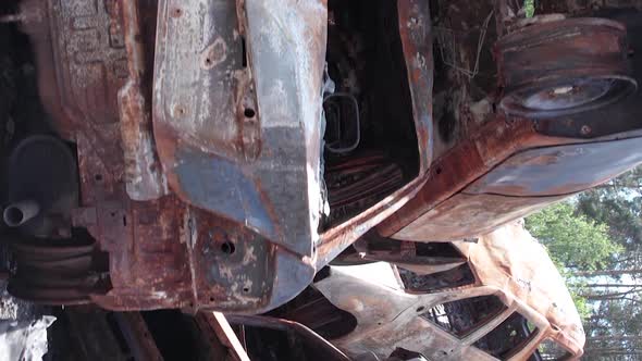 Vertical Video Irpin Bucha District  Destroyed Cars During the War in Ukraine alt