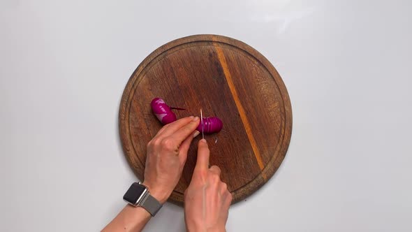 Unknown Woman Holding a Knife in Her Hands and Cutting Tomatoes While Cooking Vegetable Salad Near alt