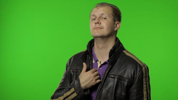 This Is Me. Rocker Man Pointing Himself and Looking at Camera. Expressing Pride in His Achievements alt