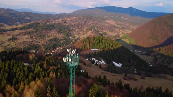 Aerial View  Telecommunication Tower with Antennas for Mobile Internet Network on Forest Background