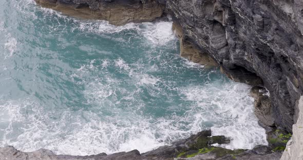 Cornwall seaside view with waves and cliffs