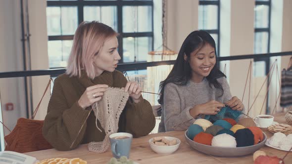 Young girls in a knitting studio alt