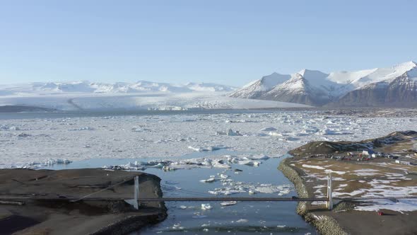 High Level Aerial View of the Glacier Lagoon in Iceland During Winter alt
