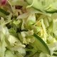 Salad ingredients in a glass bowl, cabbage, radish, onion, cucumber, egg. Salad preparation. - VideoHive Item for Sale
