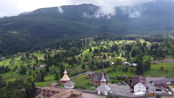 Traditional Monastery In Borsa, Aerial View, Romania alt