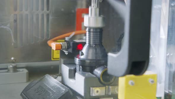 Advanced robotic machine manufacturing parts in an automated assembly line alt