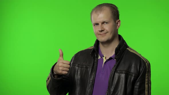 Man Showing Thumbs Up Sign, Smiling, Laughing, Satisfied with Excellent Result, Good Service alt