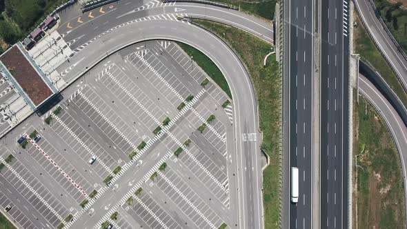 AERIAL MS Empty parking lot and highways amid Coronavirus pandemic / Florence, Tuscany, Italy