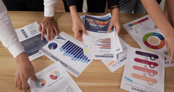 Closeup of hand pointing and explaining the information alt