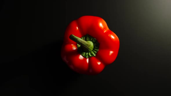 Bell Pepper Rotates On A Black Surface