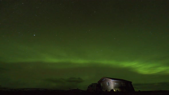 Northern Lights Over the Campervan and Cabin