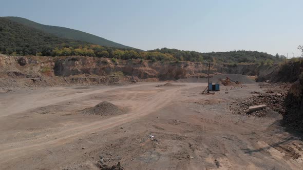 Landscape of an Abandoned Sandy Quarry on a Summer Day alt
