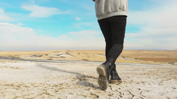 Slow Motion Tracking Of Exploring Woman In Black Jeans   alt
