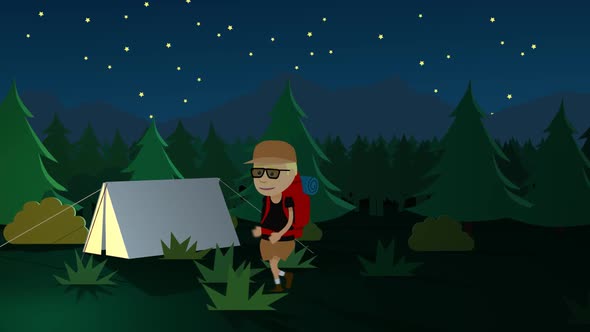 The tourist is walking in the dark forest near the camp with fireplace and tent.