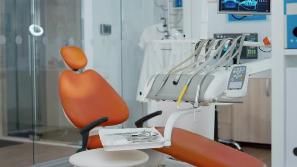 Close Up of Dental Chiar in Empty Dentist Stomatology Hospital Office with Nobody in It alt