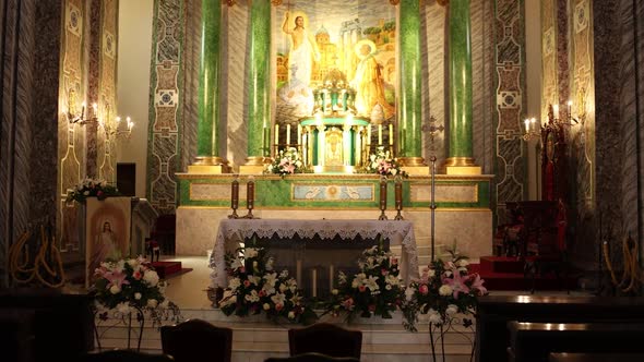 beautiful catholic church altar inside decor and candles alt
