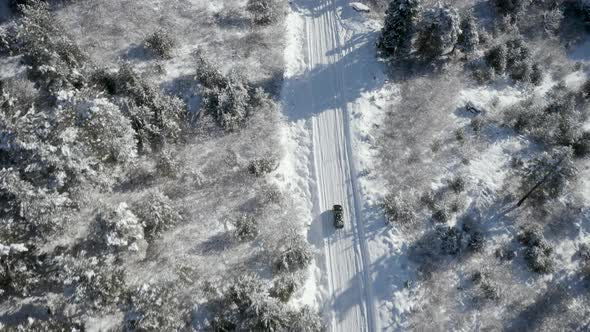 Vehicle Driving Winter Road In Countryside Aerial Top Down