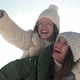 Young Woman and Her Teenage Daughter are Having Fun on a Winter Walk - VideoHive Item for Sale