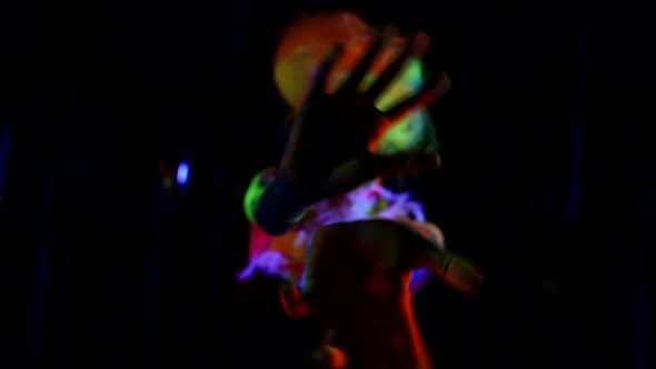 Mysterious Female Image for Halloween Party or Theatrical Performance Fluorescent Makeup in UV alt