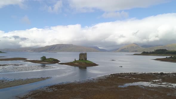 Castle Stalker in Argyll, Scotland.This castle is situated on a tidal islet on Loch Laich, midway b alt