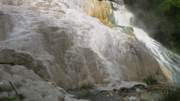 Geothermal pool and hot spring in Tuscany, Italy. Bagni San Filippo natural thermal waterfall in the alt