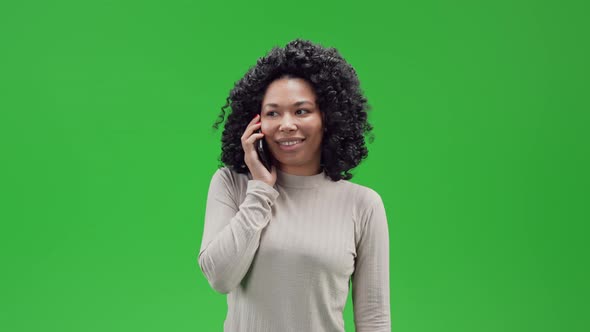 Green Screen Young African Female Has Phone Conversation