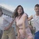 Middle Shot of Young Cheerful Friends Performing Modern Dance on City Square at Sunrise. Portrait of - VideoHive Item for Sale