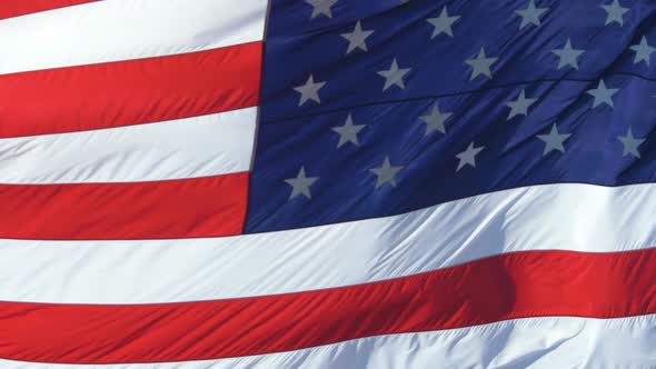 Waving American Flag Background on Strong Wind
