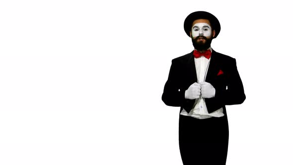 Man Mime Talks To Somebody on White Background alt