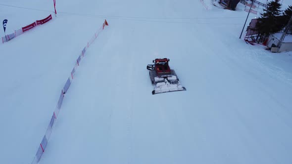 Aerial Wiev Snow Groomer Ratrak In Work 4K alt